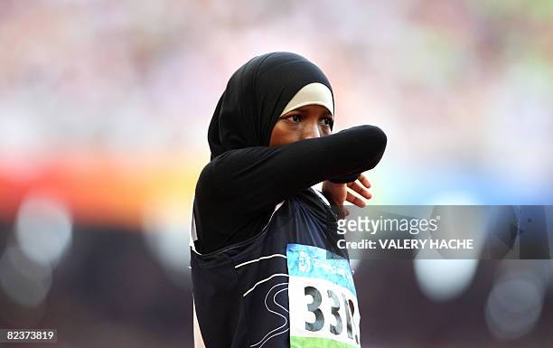Yemen's Waseelah Saad reacts after competing in the women's 100m heat 9 at the "Bird's Nest" National Stadium as part of the 2008 Beijing Olympic...