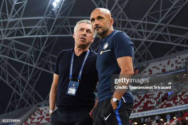Head coach of FC Interernazionale Luciano Spalletti and FC Bayern Muenchen team manager Carlo Ancelotti talks during the International Champions Cup...