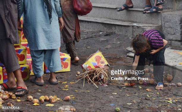 Afghan girls collecting usable fruits and vegetables form Badami Bagh market. Pakistan is among 11 countries which represent almost 50 percent of the...