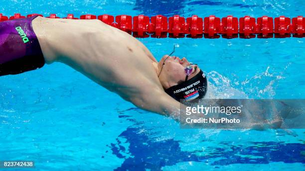 Kliment Kolesnikov , competes in the men's 200m backstroke final at the 17th FINA World Championships in Budapest.