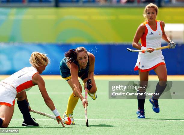 Hope Munro of Australia shoots the ball during the Women's Pool WA Match W20 between Australia and the Netherlands at the Olympic Green Hockey Field...