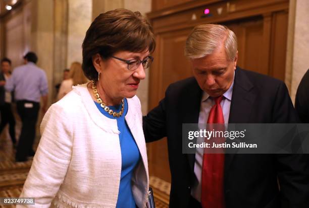 Sen. Susan Collins and Sen. Lindsey Graham leave the the Senate chamber at the U.S. Capitol after voting on the GOP 'Skinny Repeal' health care bill...