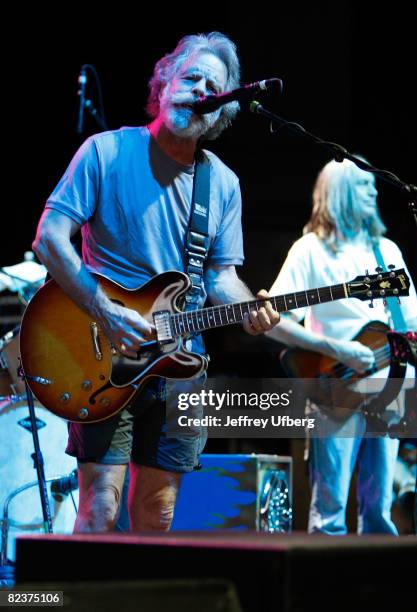 Guitarist and vocalist Bob Wier and gitarist Robin Sylvester of Bob Weir & RatDog performs at the PNC Bank Arts Center on August 15, 2008 in Holmdel,...