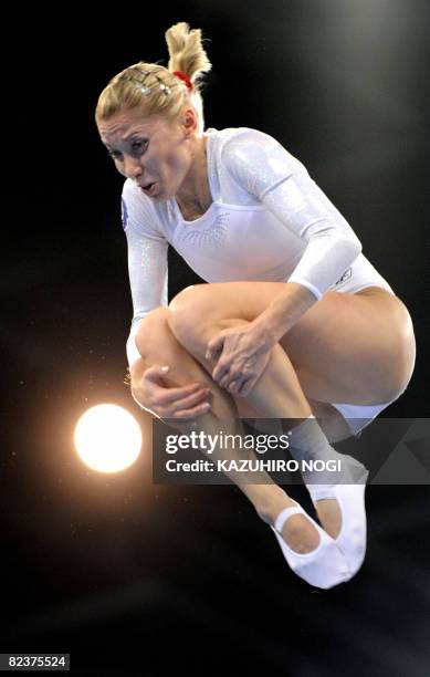 Russia's Irina Karavaeva performs during the women's qualification round of the trampoline gymnastics event at the Beijing 2008 Olympic Games in...