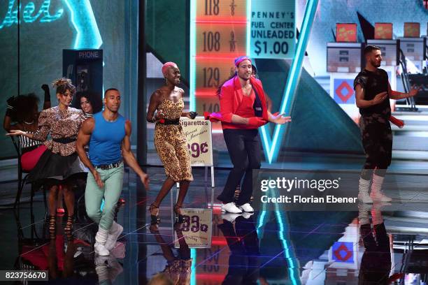 Aminata Sanogo and Marc Eggers perform on stage during the 1st show of the television competition 'Dance Dance Dance' on July 12, 2017 in Cologne,...