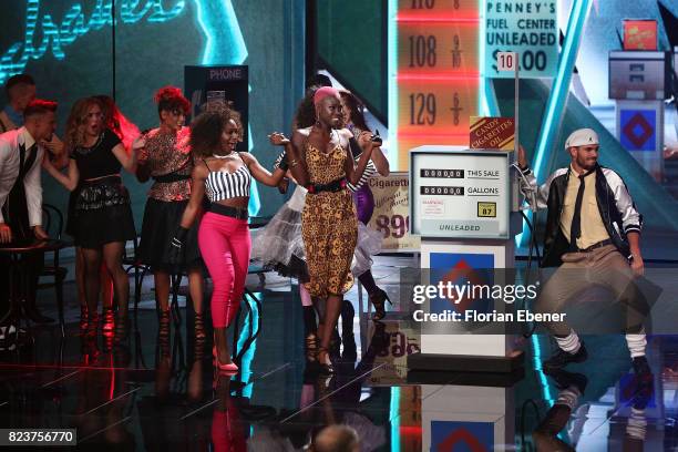 Aminata Sanogo and Marc Eggers perform on stage during the 1st show of the television competition 'Dance Dance Dance' on July 12, 2017 in Cologne,...