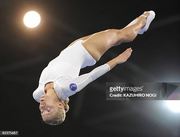 Irina Karavaeva of Russia performs during the women's qualification round of the trampoline gymnastics event at the Beijing 2008 Olympic Games in...
