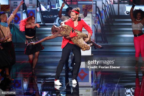 Aminata Sanogo and Marc Eggers perform on stage during the 1st show of the television competition 'Dance Dance Dance' on July 12, 2017 in Cologne,...