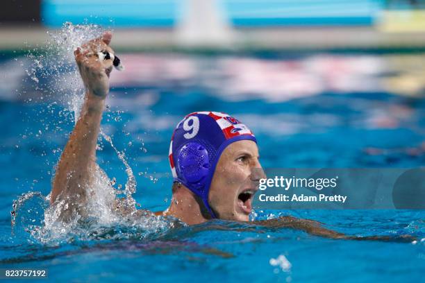 Sandro Sukno of Croatia celebrates during the Mens Waterpolo Semi-final match against Serbia on day fourteen of the Budapest 2017 FINA World...