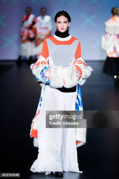 Model showcases designs of Kenneth Yeung on the runway during the Knitwear Symphony 2016 & The 6th Hong Kong Young Knitwear Designers' Contest on the...