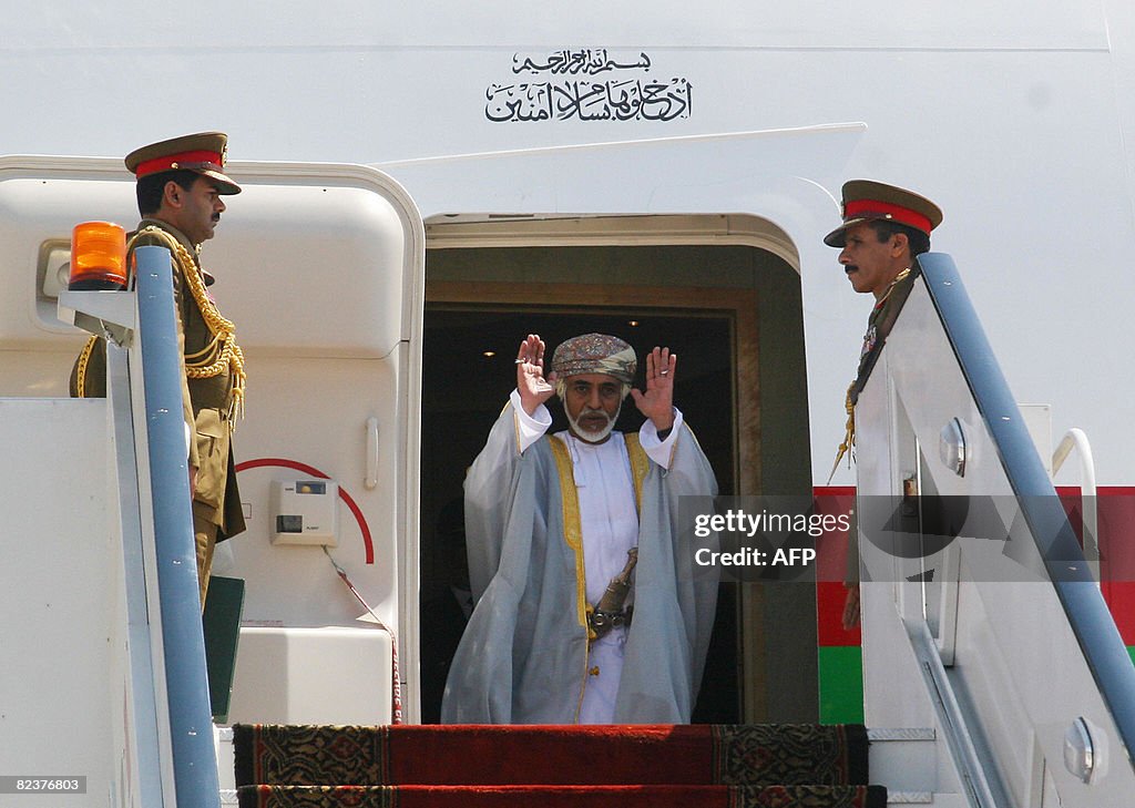 Omani leader Sultan Qaboos waves from th