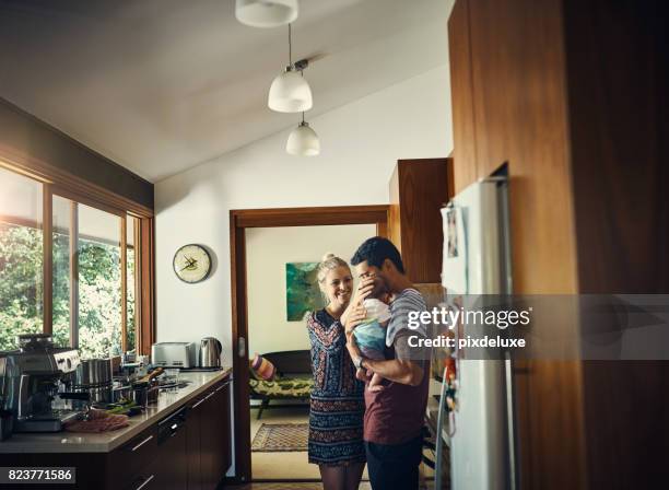 they just added more love to their home - young family stock pictures, royalty-free photos & images