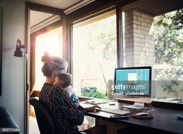 balancing a new business and a new baby - working mother at home stock pictures, royalty-free photos & images