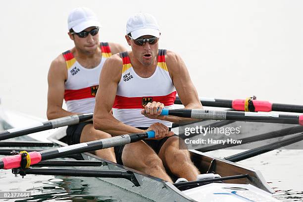 Manuel Brehmer and Jonathan Koch of Germany compete in the Lightweight Men's Double Sculls Final B at the Shunyi Olympic Rowing-Canoeing Park on Day...