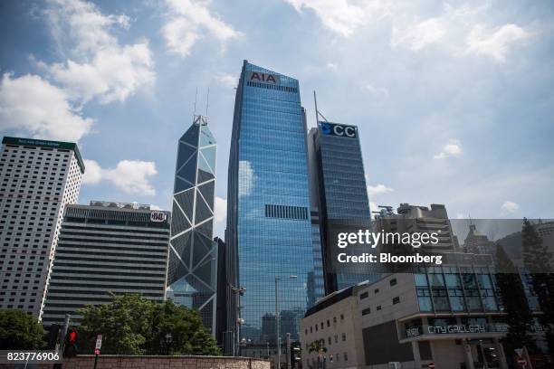 The AIA Central building, which houses the headquarters of AIA Group Ltd., center, stands near the Bank of America Tower, from left, Hutchison House,...