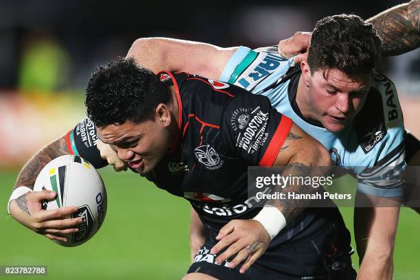 Issac Luke of the Warriors charges forward during the round 21 NRL match between the New Zealand Warriors and the Cronulla Sharks at Mt Smart Stadium...