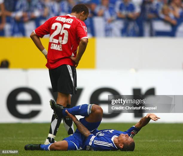 Jermaine Jones of Schalke lies after an injury on the pitch during the Bundesliga match between Schalke 04 and Hannover 96 at the Veltins Arena on...