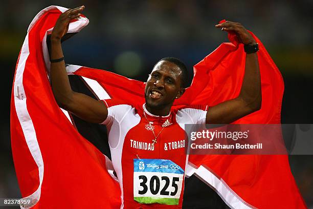 Richard Thompson of Trinidad and Tobago celebrates second place in the Men's 100m Final and the silver medal at the National Stadium on Day 8 of the...
