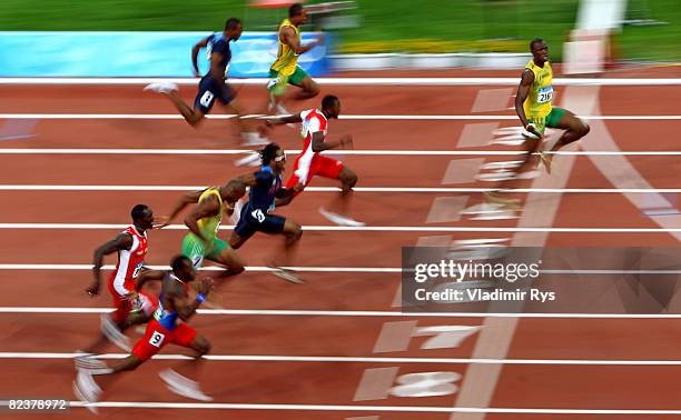 Usain Bolt of Jamaica crosses the line on his way to winning the Men's 100m Final at the National Stadium on Day 8 of the Beijing 2008 Olympic Games...