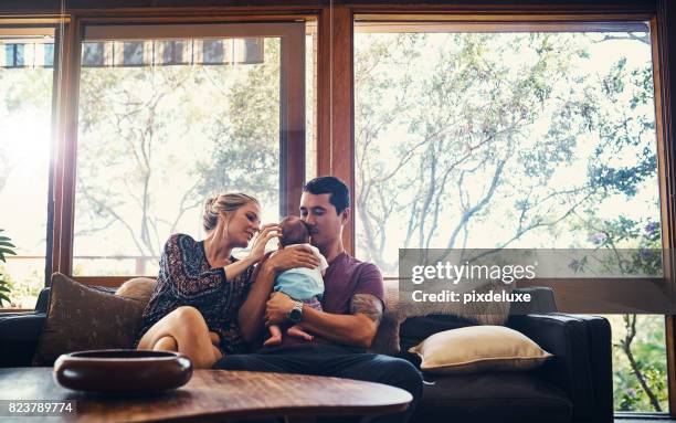 the beginning of a beautiful family - new sofa stock pictures, royalty-free photos & images