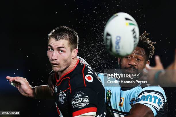 Kieran Foran of the Warriors passes the ball out during the round 21 NRL match between the New Zealand Warriors and the Cronulla Sharks at Mt Smart...