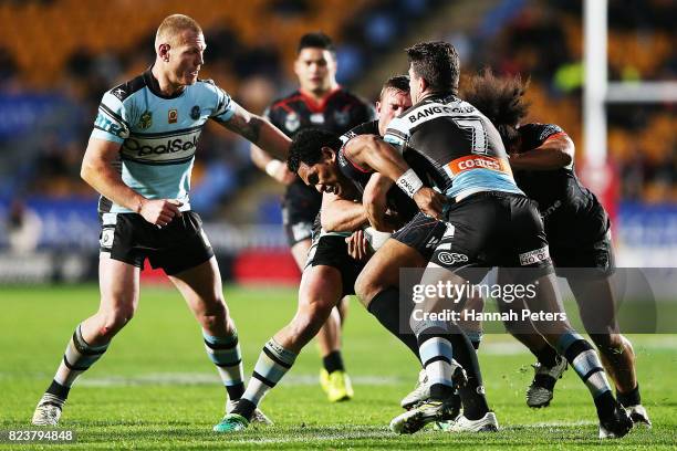 Solomone Kata of the Warriors charges forward during the round 21 NRL match between the New Zealand Warriors and the Cronulla Sharks at Mt Smart...