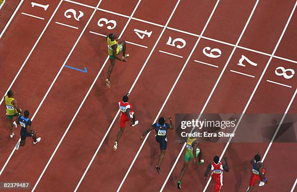 Usain Bolt of Jamaica crosses the line to win the Men's 100m Final at the National Stadium on Day 8 of the Beijing 2008 Olympic Games on August 16,...