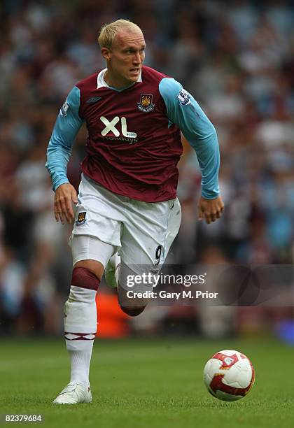 Dean Ashton of West Ham United in action during the Barclays Premier League match between West Ham United and Wigan Athletic at Upton Park on August...