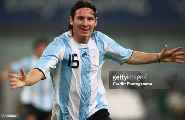 Lionel Messi of Argentina celebrates the first goal during the Men's Quarter Final match between Argentina and Netherlands at Shanghai Stadium on Day...