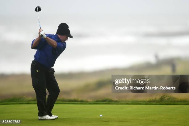 Peter Lonard of Australia tees off on the 2nd hole during the second round of the Senior Open Championship presented by Rolex at Royal Porthcawl Golf...