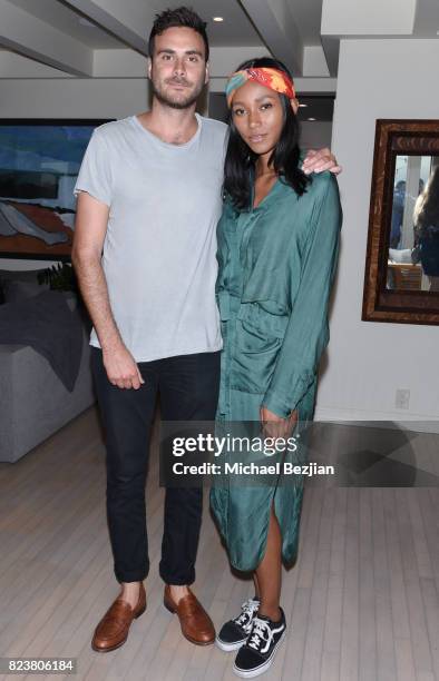 Andrew Renzi and Lucy Malik attend "The Awakening Sea" Launch Party By Rowena Patterson on July 27, 2017 in Malibu, California.