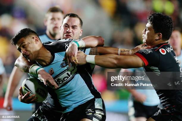 Fa'amanu Brown of the Sharks charges forward during the round 21 NRL match between the New Zealand Warriors and the Cronulla Sharks at Mt Smart...