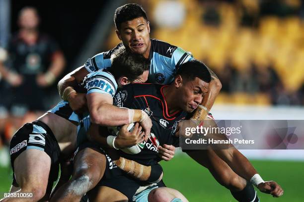 David Fusitu'a of the Warriors charges forward during the round 21 NRL match between the New Zealand Warriors and the Cronulla Sharks at Mt Smart...