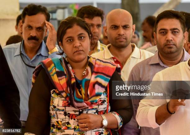 Maharashtra Chief Minister Devendra Fadnavis and WCD Minister Pankaja Munde arrive at Vidhan Bhavan on day 4 of the Monsoon Assembly Session, on July...