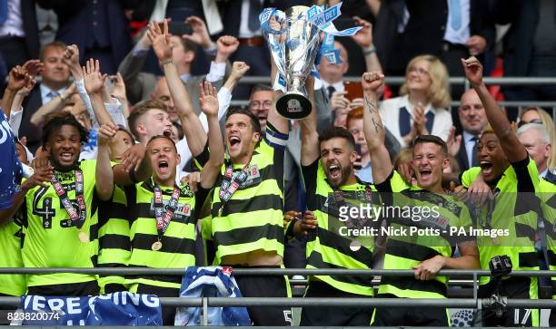 Huddersfield Town' captain Mark Hudson and Tommy Smith lift the trophy after winning the Sky Bet Championship play-off final at Wembley Stadium,...