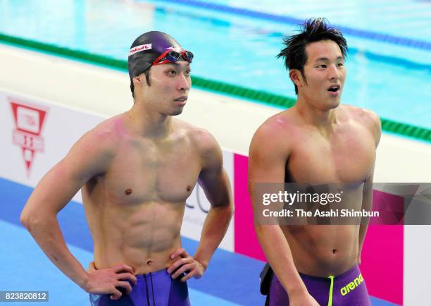 Kosuke Hagino and Daiya Seto of Japan react after competing in the Men's 200m Individual Medley final on day fourteen of the Budapest 2017 FINA World...