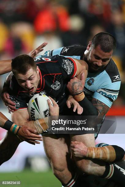 Kieran Foran of the Warriors charges forward during the round 21 NRL match between the New Zealand Warriors and the Cronulla Sharks at Mt Smart...