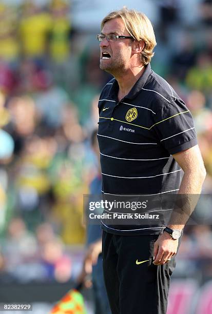 Head coach Juergen Klopp of Dortmund gestures during the Bundesliga match between Bayer Leverkusen and Borussia Dortmund at the Bay Arena on August...