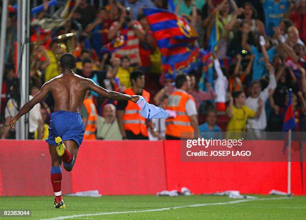 Barcelona's Cameroon Samuel Eto'o celebrates his goal during their 43th Trophy Joan Gamper friendly football match against Boca Juniors at Camp Nou...