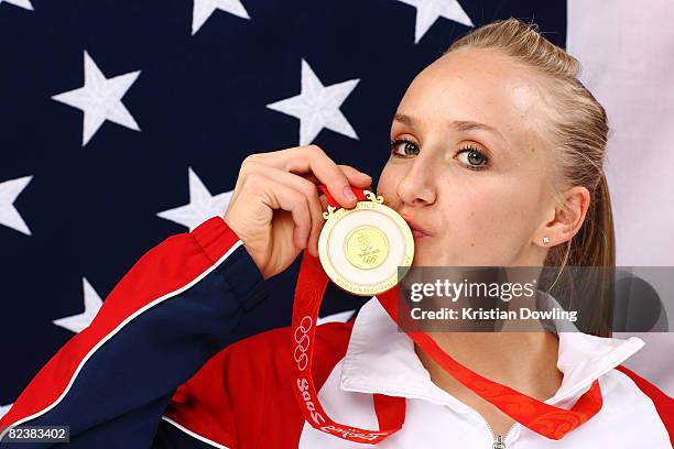 Nastia Liukin of the United States poses with her gold medal after winning the Women's all around Gymnastics event in the NBC Today Show Studio at...