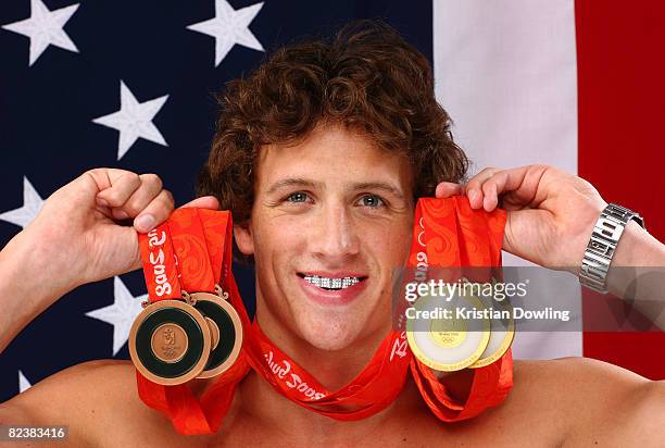 Ryan Lochte of the United States poses with his medals in the NBC Today Show Studio at the Beijing 2008 Olympic Games on August 15, 2008 in Beijing,...