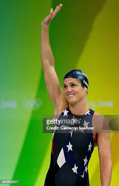Dara Torres of the United States waves to the crowd before competing in the Women's 50m Freestyle final held at the National Aquatics Centre during...