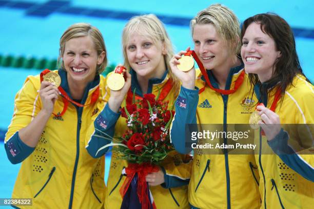 Lisbeth Trickett, Jessicah Schipper, Leisel Jones and Emily Seebohm of Australia pose with their gold medals from the Women's 4x100m Medley Relay...
