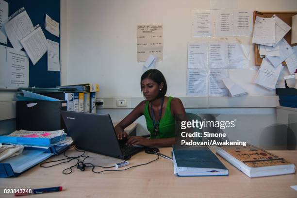 Member of staff works in the offices of Hub CARA. Here they manage all the paths of the asylum seekers from their arrival in Italy until their...