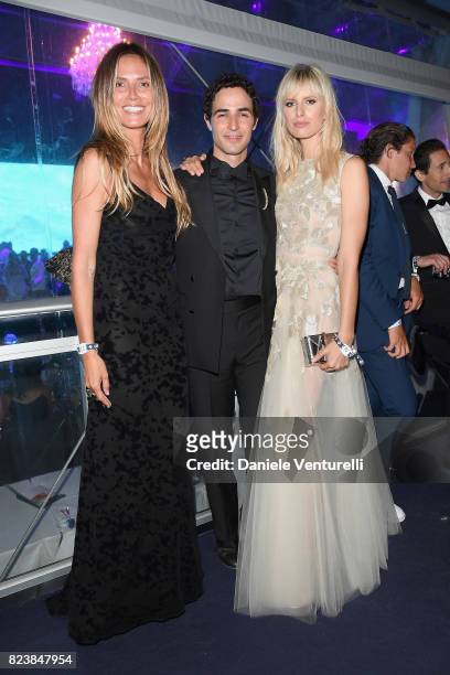 Heidi Klum, Zac Posen and Karolina Kurkova attend the Leonardo DiCaprio Foundation 4th Annual Saint-Tropez Gala at Domaine Bertaud Belieu on July 27,...