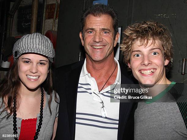 Actor Mel Gibson poses with actors Alexandra Socha and Hunter Parrish as he visits "Spring Awakening" on Broadway at the Eugene O'Neill Theater on...