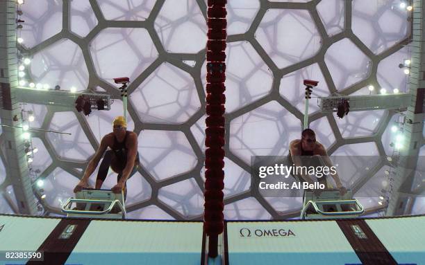 Grant Hackett of Australia and Ryan Cochrane of Canada gets sets on the starting blocks for the Men's 1500m Freestyle at the National Aquatics Centre...