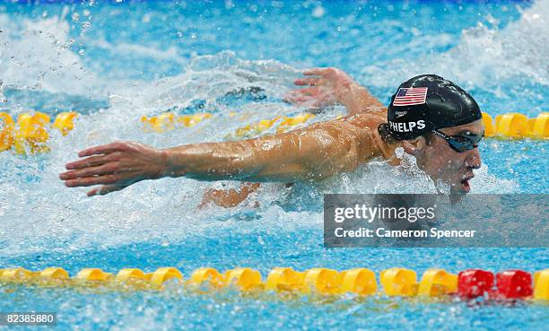 Michael Phelps of the Unites States competes in the butterfly leg of the Men's 4x100 Medley Relay held at the National Aquatics Centre during Day 9...