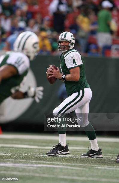 Quarterback Brett Favre of the New York Jets spots a receiver as the Jets host the Washington Redskins in a pre-season NFL game at Giants Stadium on...