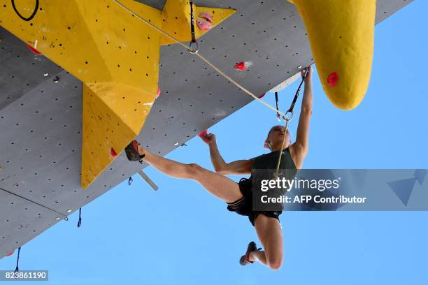 Slovenia's Janja Garnbret - women's world number one - climbs during the semi-final of 2017 International Federation of Sport Climbing Climbing World...